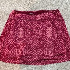 SkirtSports dark red/ light pink Patterned skort with built in shorts.